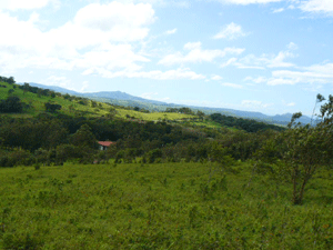 A southwestern view shows distant hills above the Guanacaste lowlands.